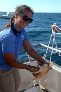 Julie, Aquarium Curator, gets ready to release one of our yearling loggerheads