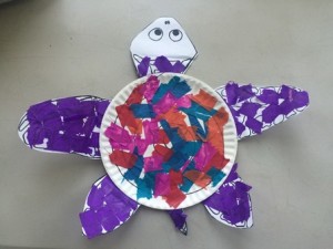 Using tissue paper is a fun way to color your sea turtle